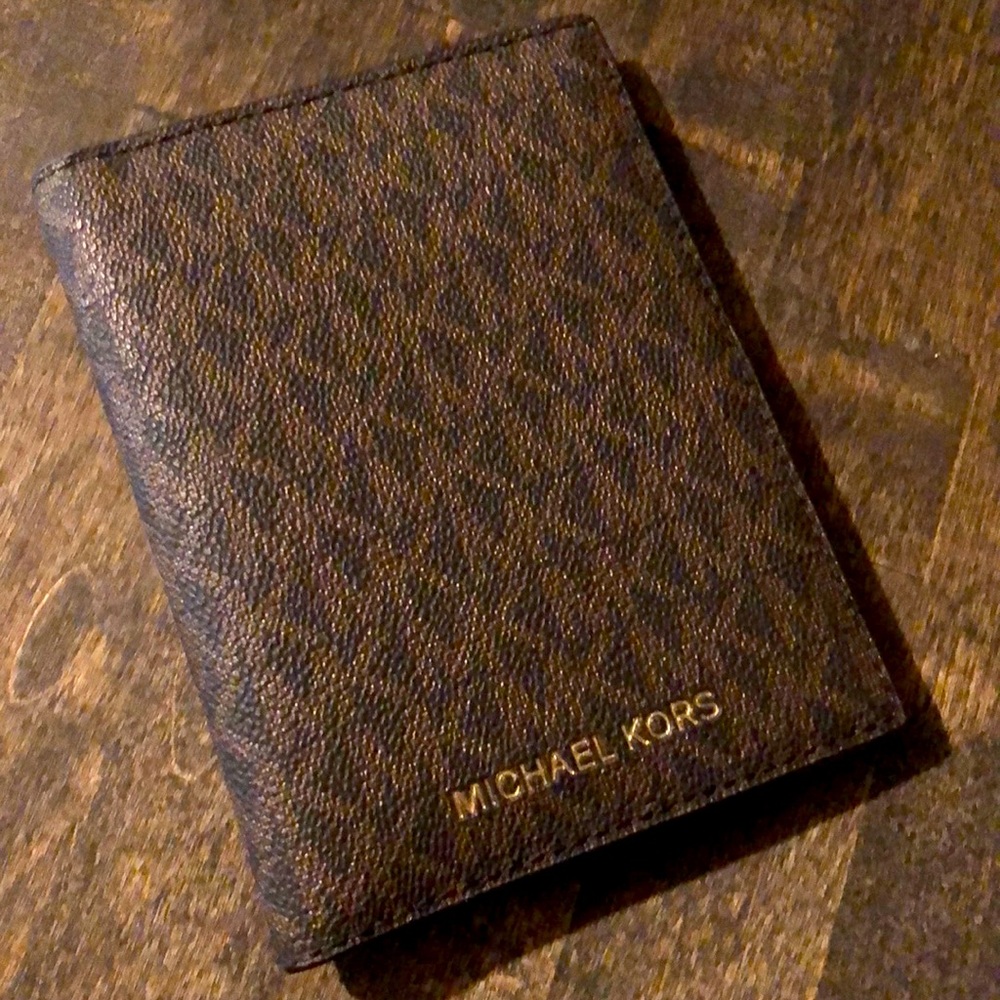 Michael Kors small logo wallet in brown.